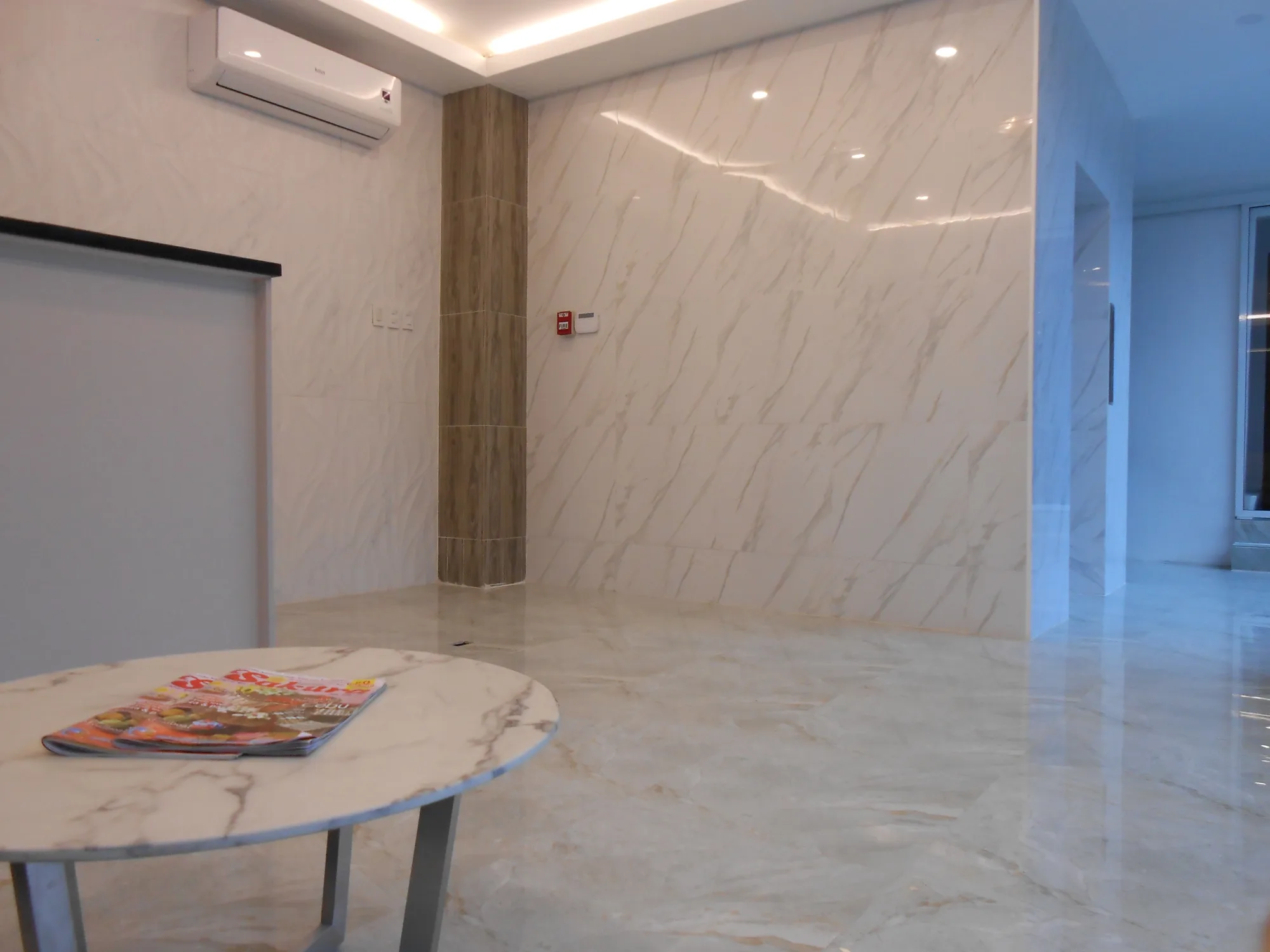 Bright marble lobby and hallway at Rublin Hotel Cebu