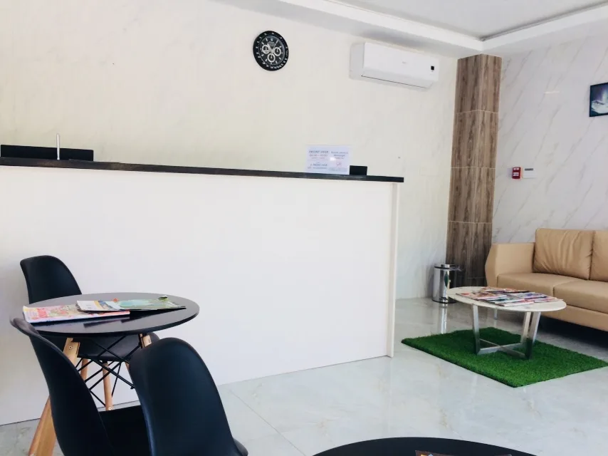 Lobby sofa and reception counter at Rublin Hotel Cebu